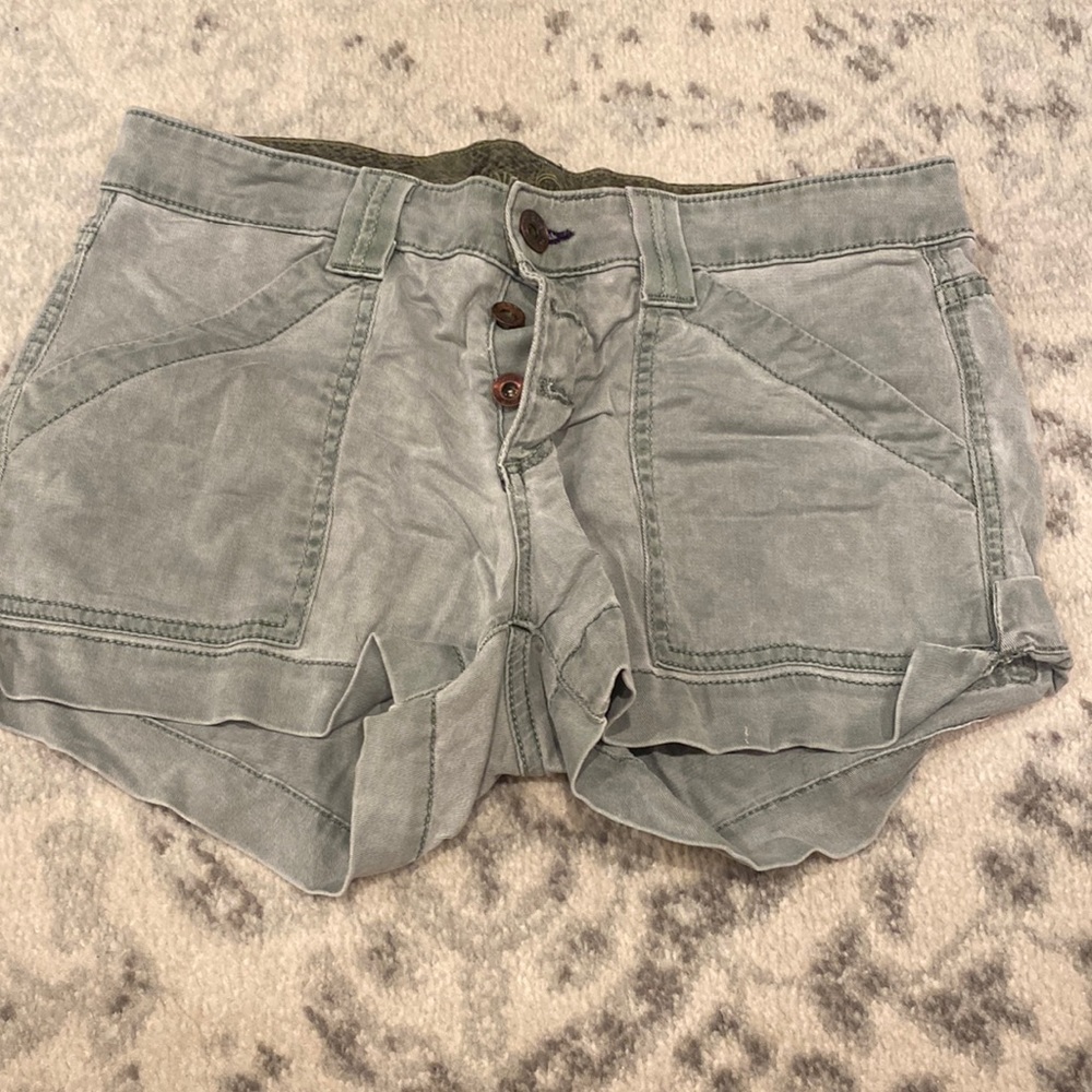 Rich and skinny button front green shorts